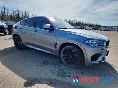 Czwarte zdjęcie samochodu z boku: 2018 BMW X6 M VIN:5YMKW8C50J0Y74743 - miniatura