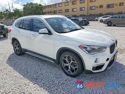 Czwarte zdjęcie samochodu z boku: 2017 BMW X1 XDRIVE28I VIN:WBXHT3C38H5F75002 - miniatura