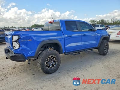 Trzecie zdjęcie samochodu z tyłu: 2025 CHEVROLET COLORADO ZR2 VIN:1GCPTFEKXS1203008 - miniatura