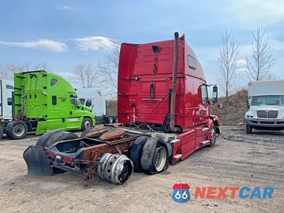 Czwarte zdjęcie samochodu z boku: 2012 VOLVO VN VNL VIN:4V4NC9EH6CN543929 - miniatura