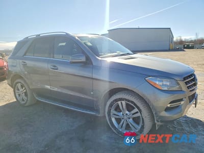 Czwarte zdjęcie samochodu z boku: 2014 MERCEDES-BENZ ML 350 BLUETEC VIN:4JGDA2EB8EA402690 - miniatura