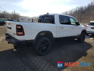 Trzecie zdjęcie samochodu z tyłu: 2020 RAM 1500 4WD V8 CREW CAB 5.7L REBEL VIN:1C6SRFLT2LN279344 - miniatura