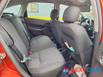 Zdjęcie 10 z 12 samochodu: 2005 FORD FOCUS ZX5 VIN:3FAHP37NX5R140796 - miniatura