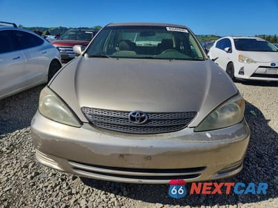 Piąte zdjęcie samochodu w środku: 2003 TOYOTA CAMRY LE VIN:JTDBE32K630184021 - miniatura