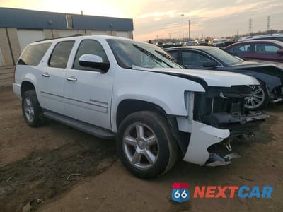Czwarte zdjęcie samochodu z boku: 2012 CHEVROLET SUBURBAN K1500 LTZ VIN:1GNSKKE71CR187552 - miniatura