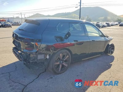 Trzecie zdjęcie samochodu z tyłu: 2024 BMW IX XDRIVE50 VIN:WB523CF04RCN52035 - miniatura