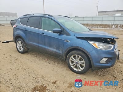 Czwarte zdjęcie samochodu z boku: 2018 FORD ESCAPE SE VIN:1FMCU9GD5JUC86691 - miniatura