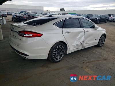Trzecie zdjęcie samochodu z tyłu: 2017 FORD FUSION TITANIUM PHEV VIN:3FA6P0SU0HR141965 - miniatura