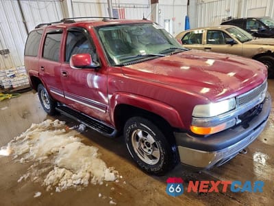 Czwarte zdjęcie samochodu z boku: 2004 CHEVROLET TAHOE K1500 VIN:1GNEK13Z64J203479 - miniatura