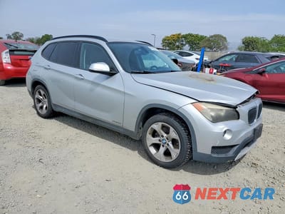 Czwarte zdjęcie samochodu z boku: 2013 BMW X1 SDRIVE28I VIN:WBAVM1C56DVW43658 - miniatura