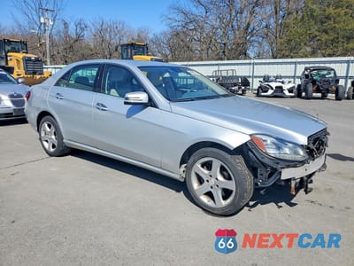 Czwarte zdjęcie samochodu z boku: 2014 MERCEDES-BENZ E 250 BLUETEC VIN:WDDHF9HBXEA906983 - miniatura