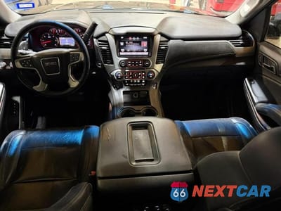 Zdjęcie 9 z 10 samochodu: 2015 GMC YUKON SLT VIN:1GKS2BKC1FR144526 - miniatura