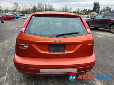 Zdjęcie 6 z 12 samochodu: 2005 FORD FOCUS ZX5 VIN:3FAHP37NX5R140796 - miniatura