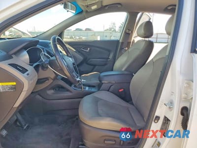 Zdjęcie 7 z 13 samochodu: 2014 HYUNDAI TUCSON VIN:KM8JU3AG0EU907431 - miniatura