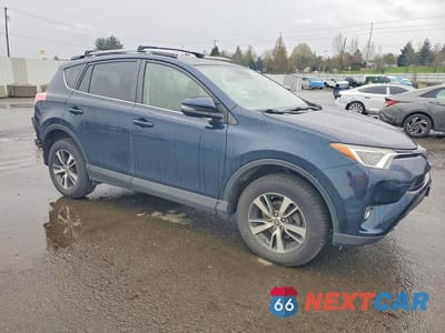 Czwarte zdjęcie samochodu z boku: 2018 TOYOTA RAV4 XLE VIN:JTMRFREV2JJ217513 - miniatura