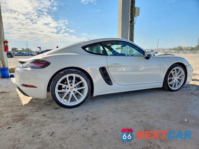 Trzecie zdjęcie samochodu z tyłu: 2024 PORSCHE CAYMAN BASE VIN:WP0AA2A8XRK255015 - miniatura