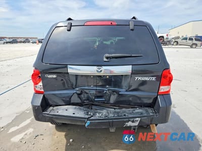 Zdjęcie 6 z 12 samochodu: 2010 MAZDA TRIBUTE I VIN:4F2CY0C78AKM01736 - miniatura