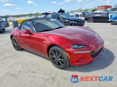 Czwarte zdjęcie samochodu z boku: 2024 MAZDA MX-5 MIATA GRAND TOURING VIN:JM1NDAD78R0603380 - miniatura
