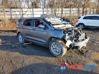 Czwarte zdjęcie samochodu z boku: 2024 FORD EDGE VIN:2FMPK4J90RBA78704 - miniatura
