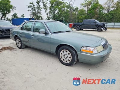 Czwarte zdjęcie samochodu z boku: 2005 MERCURY GRAND MARQUIS GS VIN:2MEFM74WX5X613238 - miniatura