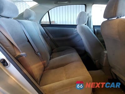 Zdjęcie 10 z 12 samochodu: 2003 TOYOTA COROLLA CE VIN:1NXBR32E63Z047888 - miniatura