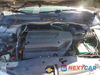 Zdjęcie 12 z 13 samochodu: 2004 HONDA ODYSSEY EX VIN:5FNRL18694B062016 - miniatura