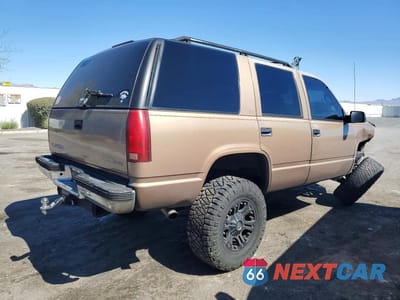 Trzecie zdjęcie samochodu z tyłu: 1995 GMC YUKON VIN:1GKEK13K6SJ765007 - miniatura