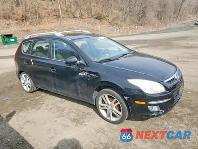 Czwarte zdjęcie samochodu z boku: 2011 HYUNDAI ELANTRA TOURING SE VIN:KMHDC8AE9BU101918 - miniatura