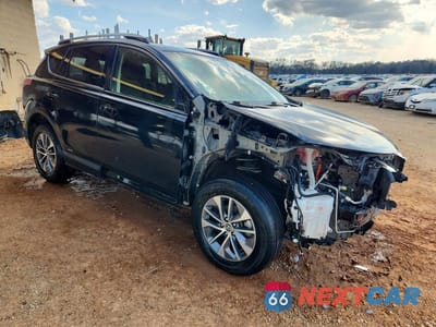 Czwarte zdjęcie samochodu z boku: 2018 TOYOTA RAV4 HYBRID XLE VIN:JTMRJREV9JD180862 - miniatura