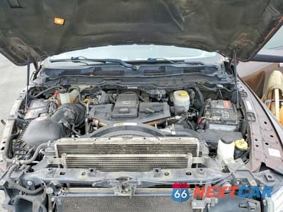 Zdjęcie 11 z 13 samochodu: 2014 RAM 2500 LONGHORN VIN:3C6UR5GL9EG279205 - miniatura