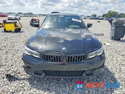 Piąte zdjęcie samochodu w środku: 2020 BMW 330I VIN:3MW5R1J01L8B11132 - miniatura