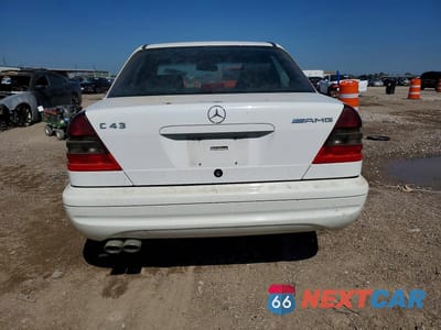 Zdjęcie 6 z 11 samochodu: 1999 MERCEDES-BENZ C 43 VIN:WDBHA33G0XF850856 - miniatura
