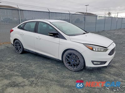 Czwarte zdjęcie samochodu z boku: 2017 FORD FOCUS SEL VIN:1FADP3H21HL207386 - miniatura