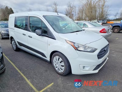 Czwarte zdjęcie samochodu z boku: 2022 FORD TRANSIT CONNECT XLT VIN:NM0LS7T25N1511909 - miniatura