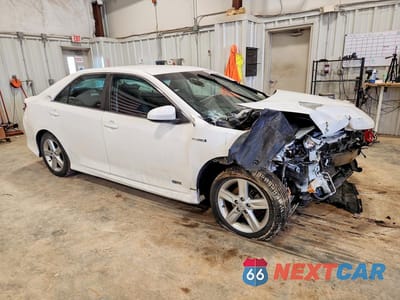 Czwarte zdjęcie samochodu z boku: 2014 TOYOTA CAMRY HYBRID SE VIN:4T1BD1FK6EU119324 - miniatura