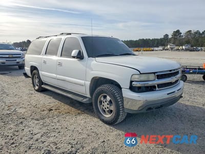 Czwarte zdjęcie samochodu z boku: 2002 CHEVROLET SUBURBAN K1500 VIN:1GNFK16Z92J190790 - miniatura
