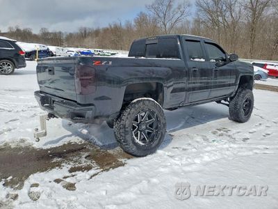 Trzecie zdjęcie samochodu z tyłu: 2018 CHEVROLET SILVERADO K1500 LT VIN:1GCVKREC1JZ301073 - miniatura