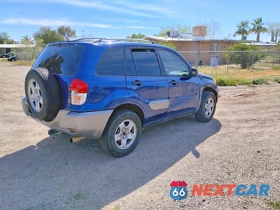 Czwarte zdjęcie samochodu z boku: 2003 TOYOTA RAV4 BASE VIN:JTEGH20V030087140 - miniatura