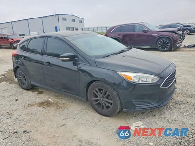 Czwarte zdjęcie samochodu z boku: 2016 FORD FOCUS SE VIN:1FADP3K20GL241374 - miniatura