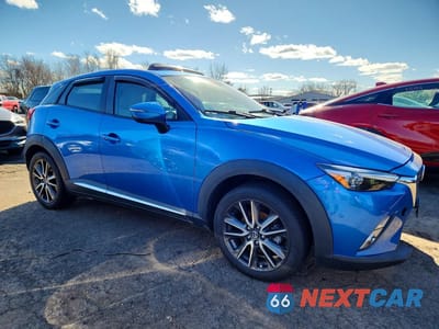 Czwarte zdjęcie samochodu z boku: 2017 MAZDA CX-3 GRAND TOURING VIN:JM1DKFD77H0164654 - miniatura