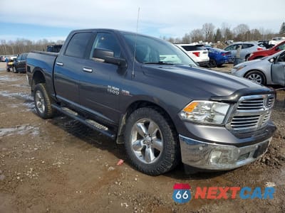 Czwarte zdjęcie samochodu z boku: 2018 RAM TRUCKS 1500 SLT VIN:1C6RR7LT7JS329710 - miniatura