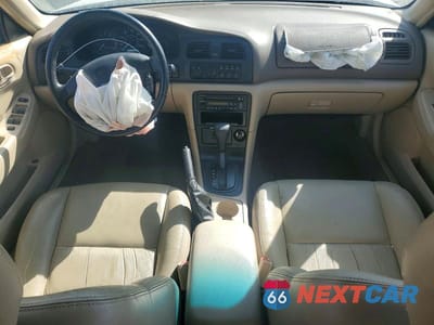 Zdjęcie 8 z 12 samochodu: 1998 MAZDA 626 DX VIN:1YVGF22C8W5773403 - miniatura