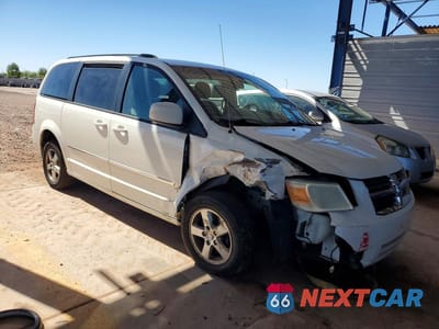 Czwarte zdjęcie samochodu z boku: 2010 DODGE GRAND CARAVAN SXT VIN:2D4RN5D14AR433937 - miniatura