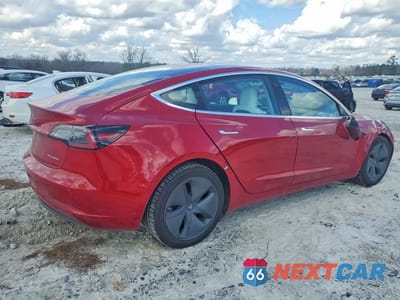Trzecie zdjęcie samochodu z tyłu: 2018 TESLA MODEL 3 VIN:5YJ3E1EB2JF075106 - miniatura