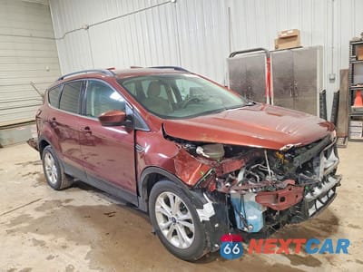 Czwarte zdjęcie samochodu z boku: 2018 FORD ESCAPE SE VIN:1FMCU0GD8JUC18509 - miniatura