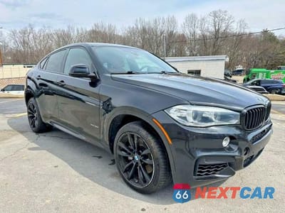 Czwarte zdjęcie samochodu z boku: 2016 BMW X6 XDRIVE50I VIN:5UXKU6C53G0R34055 - miniatura