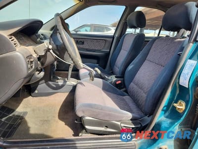 Zdjęcie 7 z 12 samochodu: 1999 NISSAN SENTRA XE VIN:3N1AB41D7XL087077 - miniatura