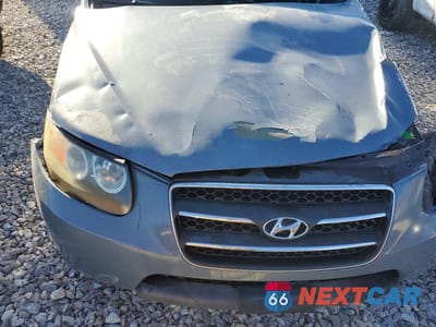 Zdjęcie 11 z 12 samochodu: 2007 HYUNDAI SANTA FE SE VIN:5NMSH13E47H033012 - miniatura