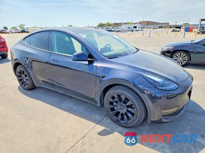 Czwarte zdjęcie samochodu z boku: 2024 TESLA MODEL Y VIN:7SAYGAEEXRF066274 - miniatura