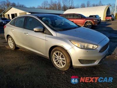 Czwarte zdjęcie samochodu z boku: 2016 FORD FOCUS SE VIN:1FADP3F26GL216649 - miniatura